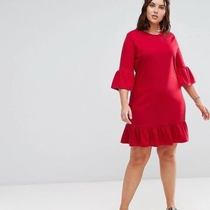 ASOS brand red dress with ruffled sleeves and hem